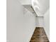 Spacious walk-in closet with custom shelving and wood flooring at 1745 S Talbott St, Indianapolis, IN 46225