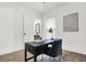 Home office with a desk, chair, and access to a bathroom at 1745 S Talbott St, Indianapolis, IN 46225