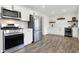 Modern kitchen with stainless steel appliances and white shaker cabinets at 1745 S Talbott St, Indianapolis, IN 46225
