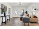 Tastefully decorated living room with hardwood floors and neutral color palette at 1745 S Talbott St, Indianapolis, IN 46225