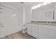 Bathroom featuring double sink vanity, shower over bath, and modern fixtures at 1845 James Pierce Dr, Shelbyville, IN 46176