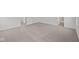 Large bedroom featuring neutral carpet and a view into the hall and another room at 1845 James Pierce Dr, Shelbyville, IN 46176