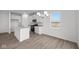 Bright kitchen featuring white cabinetry, stainless appliances, and gray countertops at 1845 James Pierce Dr, Shelbyville, IN 46176