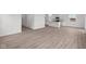 Open concept living space with modern flooring and plenty of natural light at 1845 James Pierce Dr, Shelbyville, IN 46176