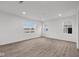 Spacious and bright living room featuring hardwood floors and large windows at 1845 James Pierce Dr, Shelbyville, IN 46176