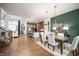 Open concept kitchen with island, stainless steel appliances, and hardwood floors at 20027 Old Dock Rd, Westfield, IN 46074