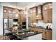 Modern kitchen with a large island, stainless steel appliances, and dark countertops at 20027 Old Dock Rd, Westfield, IN 46074