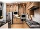 Modern kitchen with stainless steel appliances and light wood cabinets at 20027 Old Dock Rd, Westfield, IN 46074
