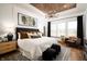 Luxurious main bedroom with a king-size bed and en-suite bathroom at 20027 Old Dock Rd, Westfield, IN 46074