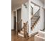 Elegant staircase with wood and metal accents at 20027 Old Dock Rd, Westfield, IN 46074