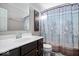 Clean bathroom with shower/tub combo and dark brown vanity at 2449 Lingerman Way, Avon, IN 46123