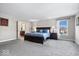 Main bedroom with en-suite bathroom and ample space for furniture at 2449 Lingerman Way, Avon, IN 46123