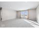 Large bonus room with carpet and natural light at 2449 Lingerman Way, Avon, IN 46123
