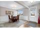 Dining room with wood table and chairs, and wall art at 2449 Lingerman Way, Avon, IN 46123