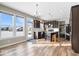 Open concept kitchen with island, dark cabinetry, and stainless steel appliances at 2449 Lingerman Way, Avon, IN 46123