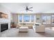 Living room features a fireplace, large windows, and a sectional sofa at 2449 Lingerman Way, Avon, IN 46123