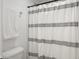 Clean bathroom with shower stall and white toilet at 4201 Risen Star Way, Bargersville, IN 46106