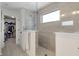 Modern bathroom with a large walk-in shower and double vanity at 4201 Risen Star Way, Bargersville, IN 46106