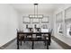 Spacious dining area with a rustic wood table and bench at 4201 Risen Star Way, Bargersville, IN 46106