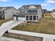 Well-kept two-story home featuring a three-car garage, pristine landscaping, and a welcoming front porch at 4201 Risen Star Way, Bargersville, IN 46106