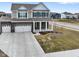 Stunning two-story residence featuring a three-car garage and manicured front yard at 4201 Risen Star Way, Bargersville, IN 46106