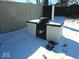 An outdoor grill surrounded by snow in the backyard on a bright day at 4818 E 14Th St, Indianapolis, IN 46201