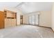 Bright main bedroom featuring a large window and built-in dresser at 5021 Tudor Cir, Carmel, IN 46033