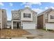 Charming two-story home features a two-car garage, covered entry, and stone accents at 5123 Rolling Meadow Blvd, Indianapolis, IN 46237