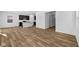 Bright open living space featuring hardwood floors, modern kitchen, and an airy design at 5123 Rolling Meadow Blvd, Indianapolis, IN 46237