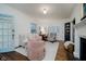 Cozy living room with hardwood floors and fireplace at 5164 Guilford Ave, Indianapolis, IN 46205