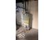 Basement utility area with water heater and furnace at 5414 E 11Th St, Indianapolis, IN 46219