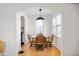 Small dining area with four chairs and a window at 6041 Norwaldo Ave, Indianapolis, IN 46220