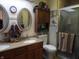 Elegant bathroom with double sinks and a separate shower at 7569 Farm View E Cir, Indianapolis, IN 46256