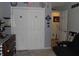Cozy bedroom with double doors to closet and adjacent room at 7569 Farm View E Cir, Indianapolis, IN 46256