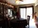 Charming dining room with a round table and access to backyard at 7569 Farm View E Cir, Indianapolis, IN 46256