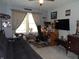 Home office or guest room with a desk and comfortable sofa at 7569 Farm View E Cir, Indianapolis, IN 46256