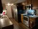 Functional kitchen with stainless steel appliances and plenty of cabinet space at 7569 Farm View E Cir, Indianapolis, IN 46256