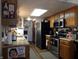 Galley kitchen with stainless steel appliances and wood cabinets at 7569 Farm View E Cir, Indianapolis, IN 46256