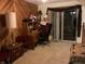 Home office with desk, storage, and sliding glass doors to the backyard at 7569 Farm View E Cir, Indianapolis, IN 46256