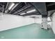 Unfinished basement with painted walls and ceiling, as well as visible ductwork at 7830 Ridgeland Dr, Indianapolis, IN 46250