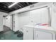 Well-lit laundry room with modern washer and dryer at 7830 Ridgeland Dr, Indianapolis, IN 46250