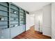 Home office features hardwood floors and a custom built-in bookshelf at 7830 Ridgeland Dr, Indianapolis, IN 46250
