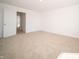 Carpeted bedroom boasting white walls and open doorway leading to additional room at 801 Blaine Dr, Whiteland, IN 46184