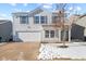 Two-story house with white siding, attached garage, and landscaping at 10905 Spirit Dr, Ingalls, IN 46048