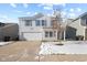 Two-story house with white siding, attached garage, and landscaping at 10905 Spirit Dr, Ingalls, IN 46048