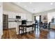 Modern kitchen with white cabinets, granite countertops and stainless steel appliances at 1128 Sorrell Pass, Greenwood, IN 46143