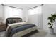 Bright bedroom with neutral decor and ample natural light at 1302 English Ave, Indianapolis, IN 46203
