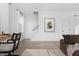 Spacious living area with hardwood floors and a modern aesthetic at 1302 English Ave, Indianapolis, IN 46203