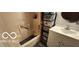 Clean bathroom with a tub/shower combo and vanity with sink at 1313 S Riley Ave, Indianapolis, IN 46203