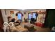 Cozy living room featuring a sofa, TV, and ample natural light at 1313 S Riley Ave, Indianapolis, IN 46203